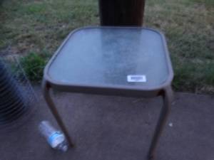 lot 23685 image: Glass Patio End table.