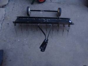 lot 23690 image: Riding mower pull behind dethatcheraerator