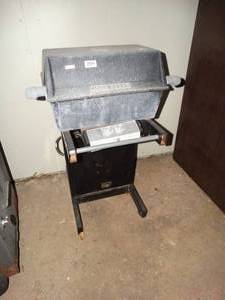 lot 23696 image: John - Deere Grill with Grilling Utensils.