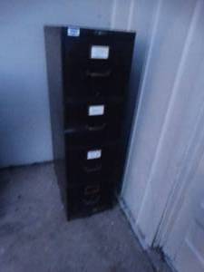 lot 23697 image: Black Metal 4 -Drawer Filing Cabinet.