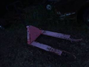 lot 23701 image: Red Mighty Pallet Jack.