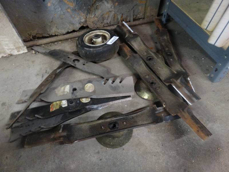 lot 456 image: Various lawn mower blades tire bag.