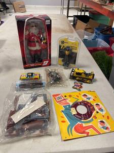 lot 64339 image: toy lot, Santa figurine, dewalt 124 die cast figurine, toy train, 45 record