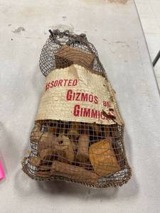 lot 64366 image: sack of wooden gizmos and gimmicks