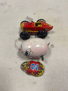 lot 64444 image: tin toy wind ups, pig, no.7 race car, no.2 tiger