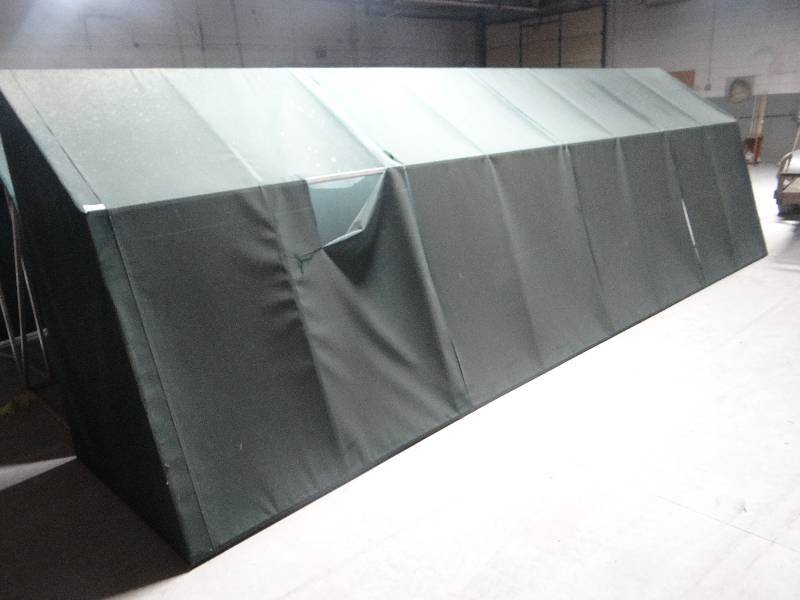 lot 167 image: Large aluminum frame canopyawning. green fabric cover. 6ft tall 4 ft deep 20ft long.
