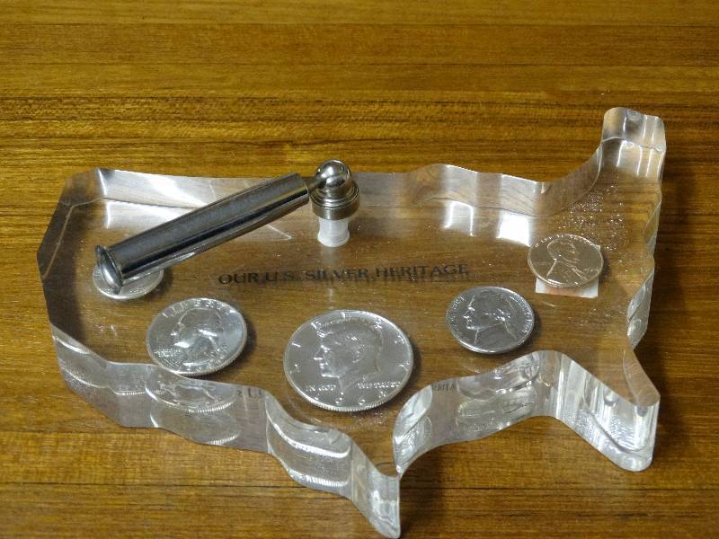lot 543 image: Our U.S. silver heritage american shape desk pen holder wsilver coins in lucite.