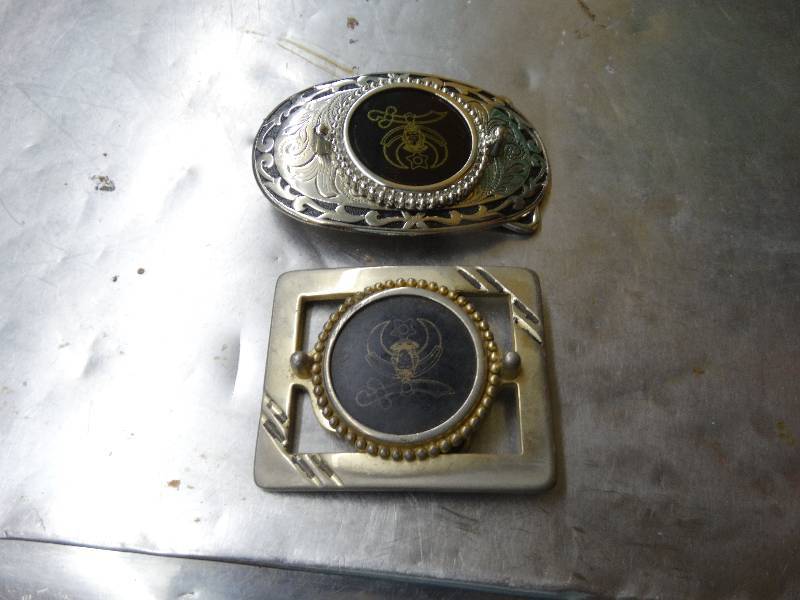 lot 573 image: 2 Midian shrine belt buckles.