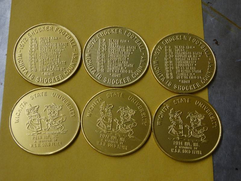 lot 586 image: Lot of 6 WSU 1972 football schedule coins.