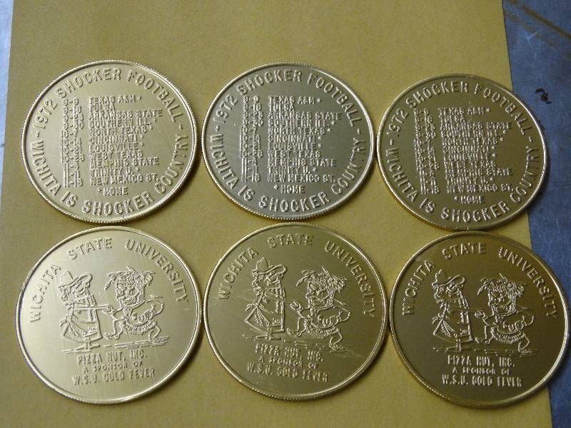 lot 587 image: Lot of 6 WSU 1972 football schedule coins.
