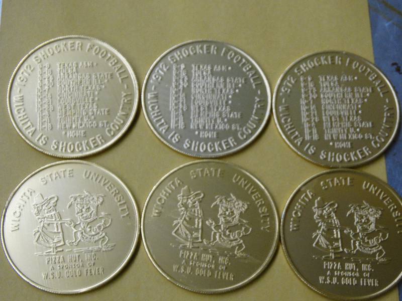 lot 588 image: Lot of 6 WSU 1972 football schedule coins.