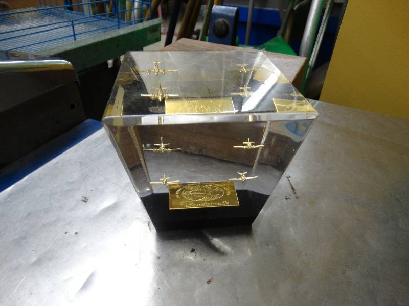 lot 590 image: Beech craft planes in lucite - very neat piece.