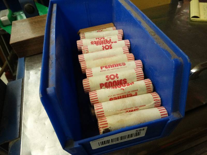 lot 594 image: 44 Rolls of un searched pennies.