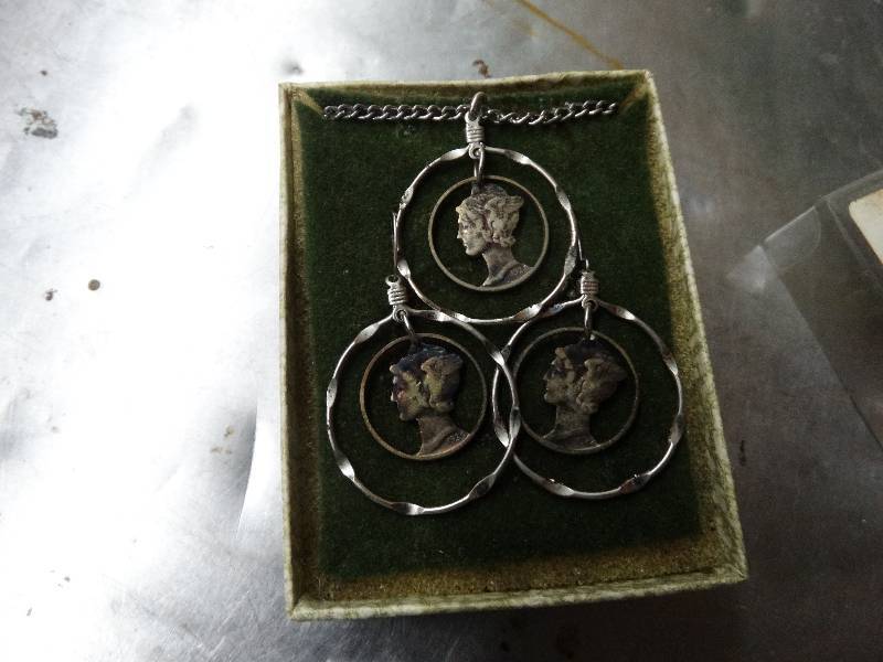 lot 595 image: Pendant & earrings made from mercury dimes.