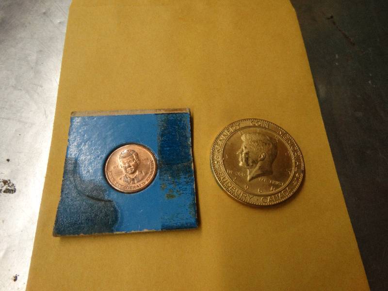 lot 598 image: 2 JFK coins.