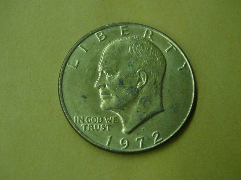 lot 599 image: Gold plated 1972 Ike dollar.
