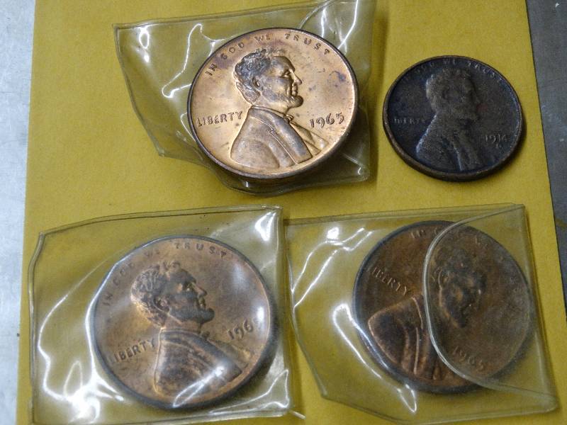 lot 607 image: 4 Large size pennies (regular size in pic for size).