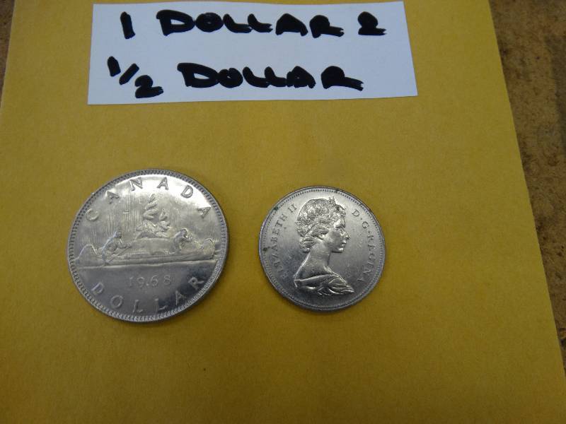 lot 613 image: 1968 Canada dollar coinhalf dollar coin.