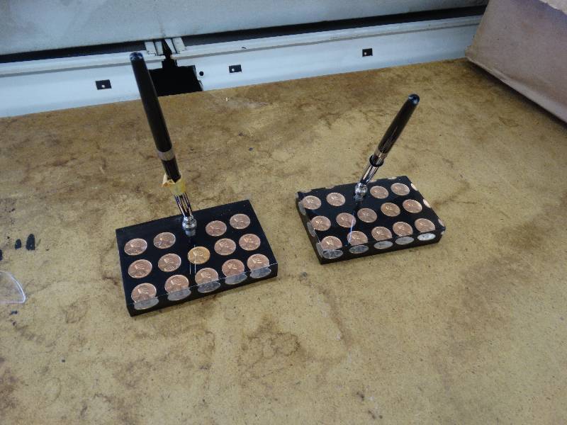 lot 639 image: 2 Lucite desk pen set wpennies.