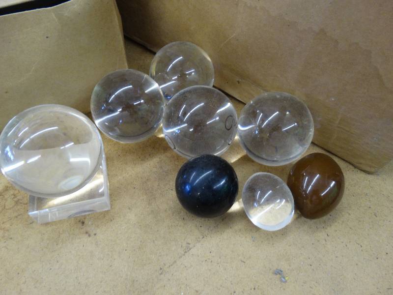 lot 648 image: 6 Lucite spheres & 2 eggs.