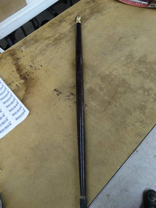 lot 654 image: Vintage prohibition cane wliquor test tube inside.
