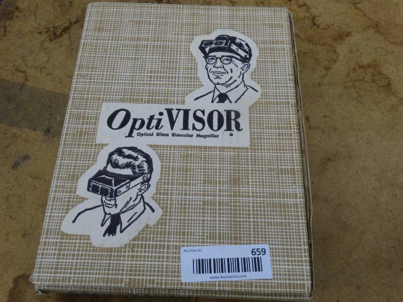 lot 659 image: Optivisor optical glass binocular magnifier in box.