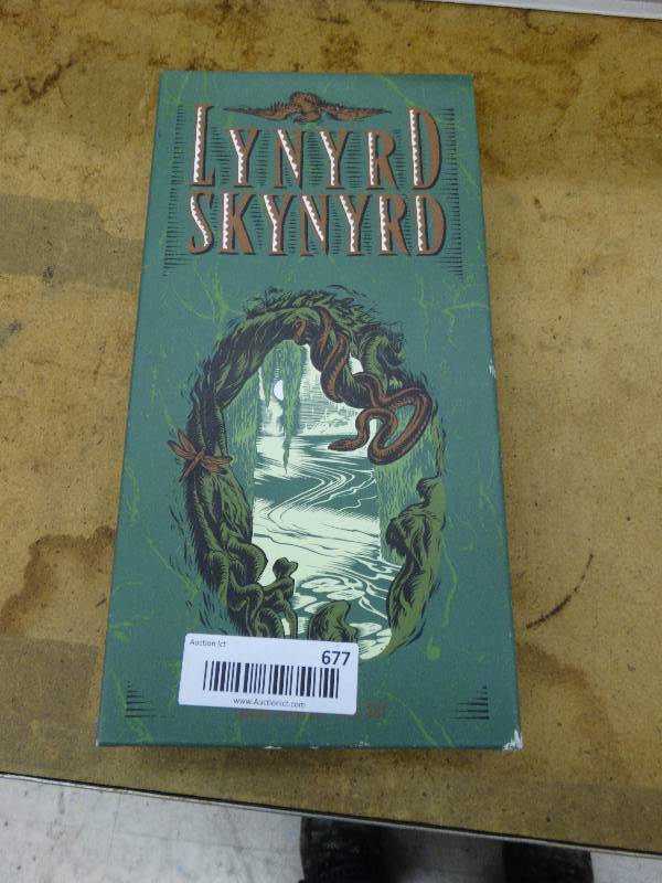 lot 677 image: Lynurd skynyrd box set.