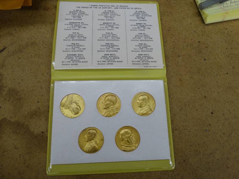 lot 682 image: The popes of the century 5 coin set in plastic.