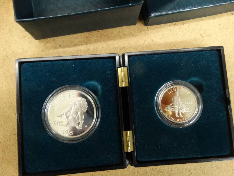 lot 684 image: U.S. mint the daguerreotype era - silver dollar coinsilver half dollar coin in case.