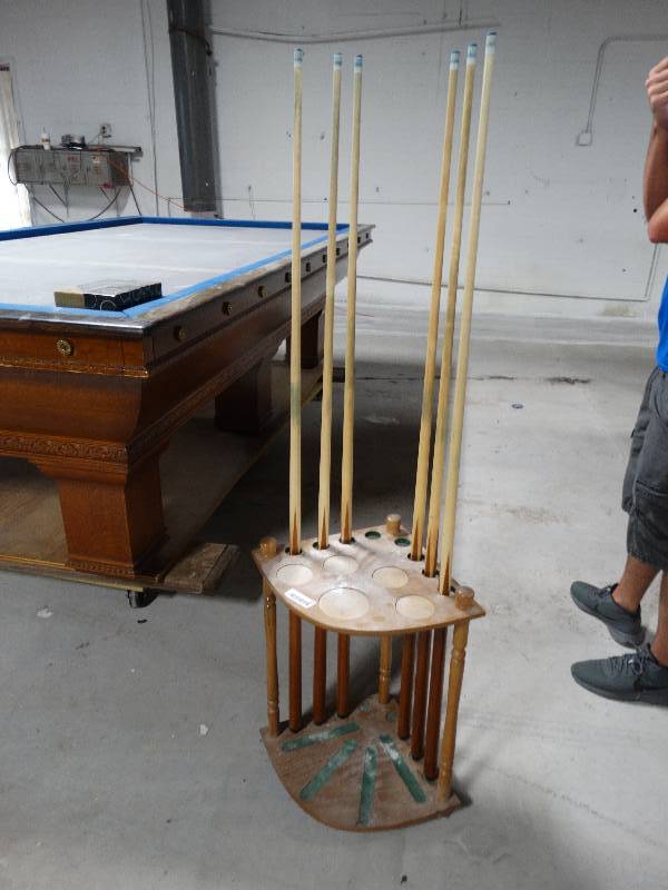 lot 101 image: Cue Rack With 6- Cue Sticks.