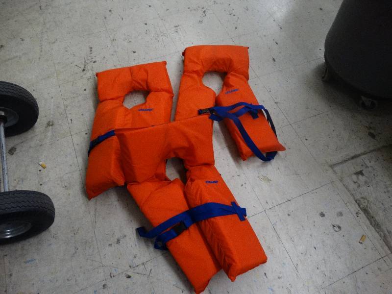 lot 120 image: 3 Stearns life vests