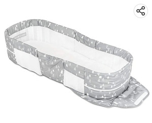 lot 11997 image: Baby Delight Snuggle Nest Harmany Portable Infant Sleeper, Silver Clouds