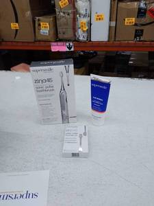 lot 11870 image: Retail - $150.00 Supersmile Zina45 Sonic Toothbrush w The Works Toothpaste, Silver