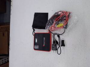 lot 11903 image: Retail - $98.96 Vector Portable Jump Starter with Case and AC Outlet