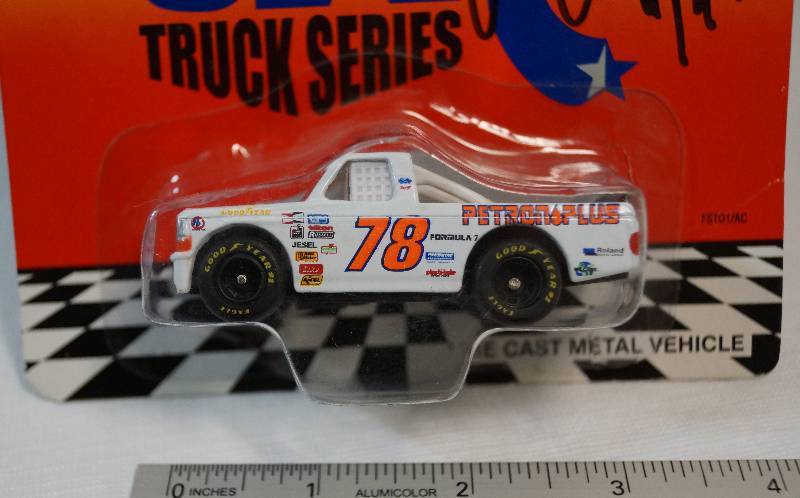 lot 8105 image: MATCHBOX Die Cast Car - Racing Super Stars TRUCK SERIES - 1996 - #78 Petron Plus - NEW IN PACKAGE