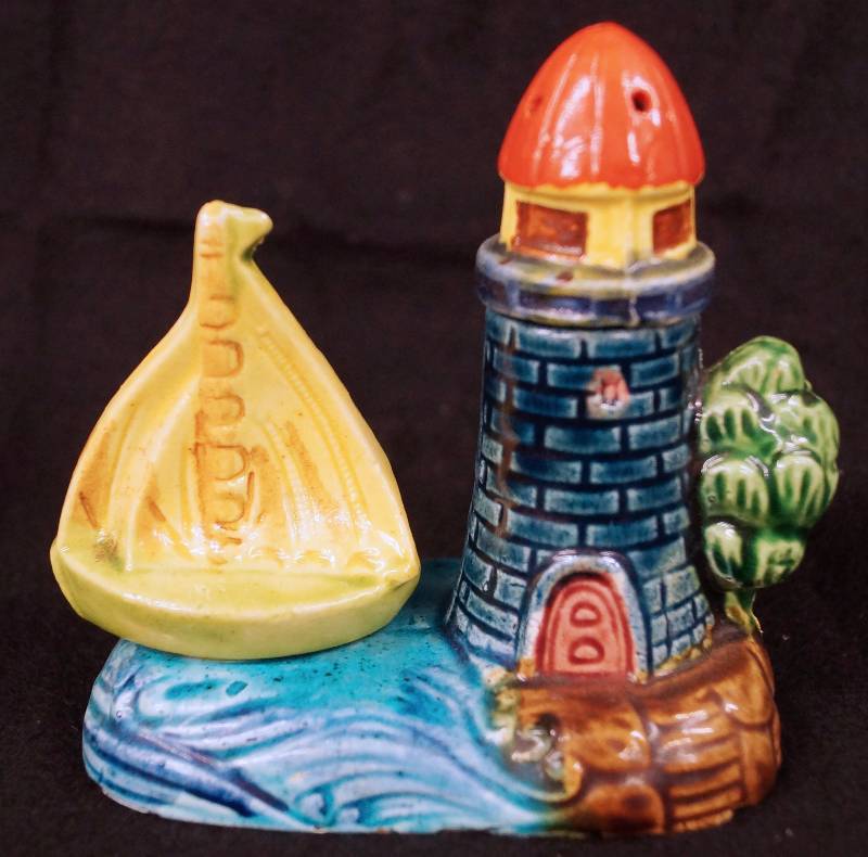 lot 8157 image: Lighthouse and Sailboat Salt and Pepper Shaker Set with Ocean Holder - nice