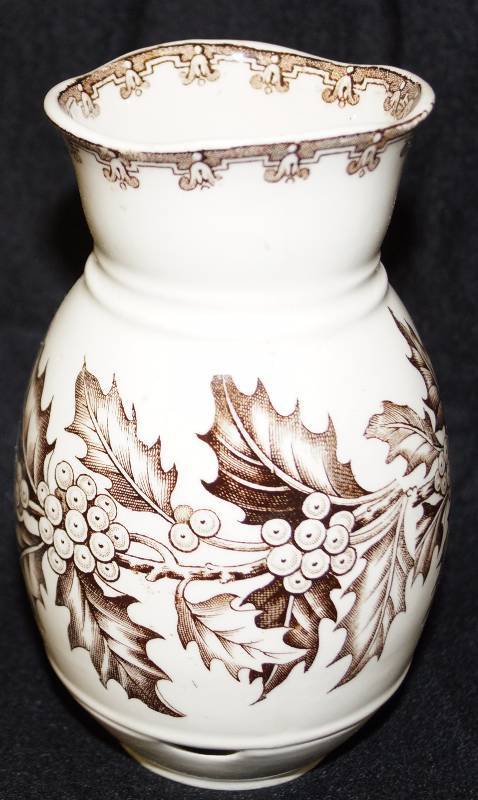 lot 8161 image: Unique Holly Berry Christmas Vase. This looks to be porcelain. Very Nice
