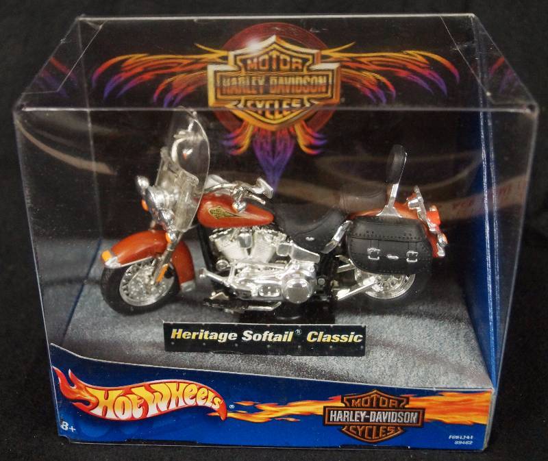 lot 8180 image: HARLEY DAVINSON - Heritage Softail Classic- HOT WHEELS - 118 Die-Cast Motorcycle - NEW IN BOX with bonus sticker inside