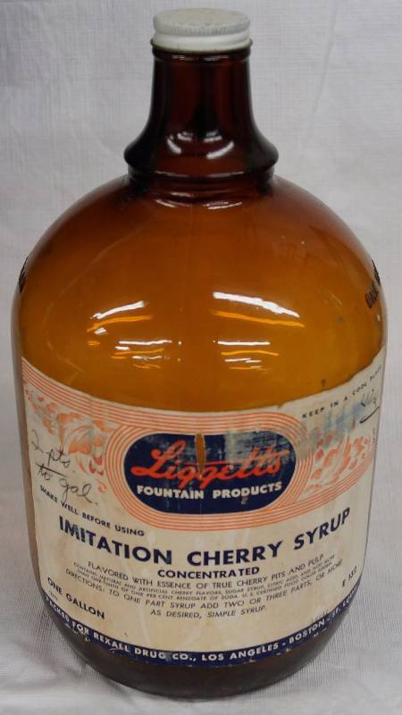 lot 8262 image: Old Liggetts Fountain Products - Imitation Cherry Syrup - One Gallon Jug