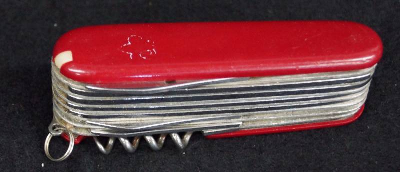 lot 8323 image: BOYS SCOUT Multi Tool Utility Pocket Knife - Knives, Pliers, Scissors, Magnifying Glass, Toothpick, Tweezers, Bottle  Can Opener  & Screwdrivers
