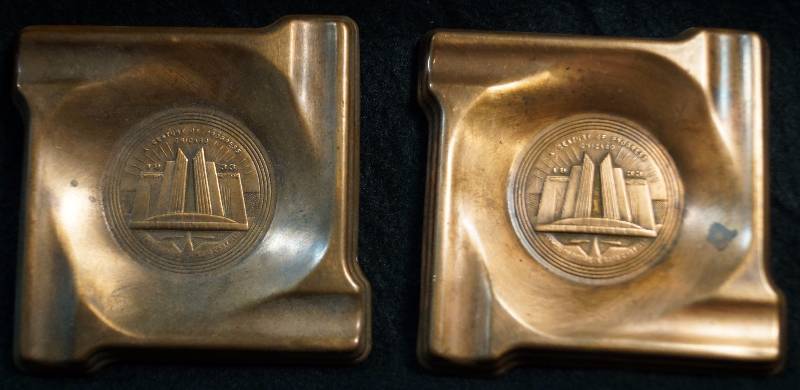 lot 8389 image: Vintage Automobile Memorabilia 1933 A Century of Progress - Chrysler, Dodge, De Soto and more Metal plaques or could also be ashtrays