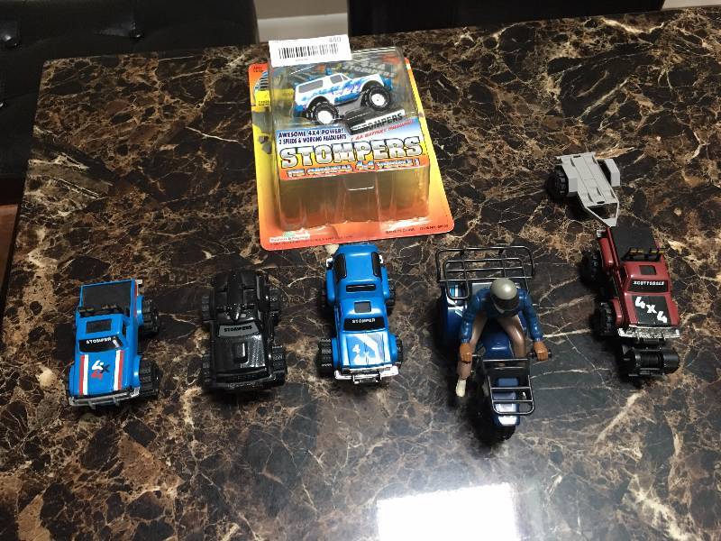 lot 440 image: Lot of Stompers Battery Powered Toy Vehicles