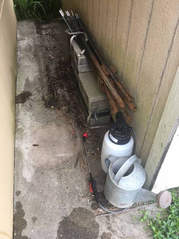 lot 470 image: Lot of T-Posts, Cinder Blocks, Water Can & Sprayer