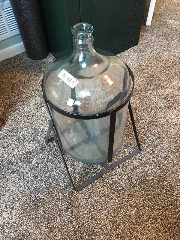lot 376 image: LARGE GLASS JUG AND METAL FRAME - GREAT FOR SAVING POCKET CHANGE