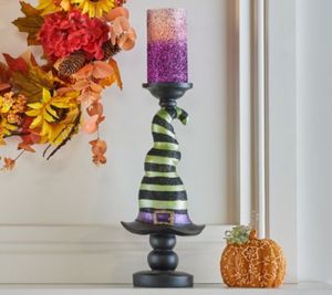 lot 10183 image: Retail - $44.00 Hay & Harvest Resin Witch Hat Pillar Holder with LED Candle