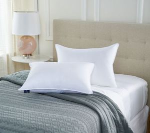 lot 10861 image: Retail - $49.00 Scott Living Duraloft Pillows with Tencel Cover, Queen set of 2, USED