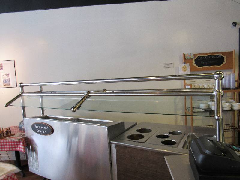 lot 952 image: 114 Chrome Framed Sneeze Guard With Track Lighting