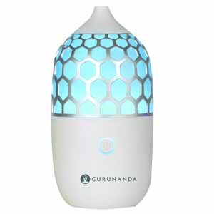 lot 7093 image: Gurunanda Honeycomb Diffuser Starter Kit