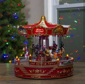 lot 55161 image: 14 LED Lighted Rosies Carousel Revolving Christmas Decor with Music(Retail $228.75)