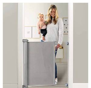 lot 55213 image: Momcozy Retractable Baby Gate, 33 Tall, Extends up to 55 Wide, Child Safety Baby Gates for Stairs, Doorways, Hallways, Indoor, Outdoor (Retail $40.99)